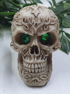 Skulls with Green Eyes