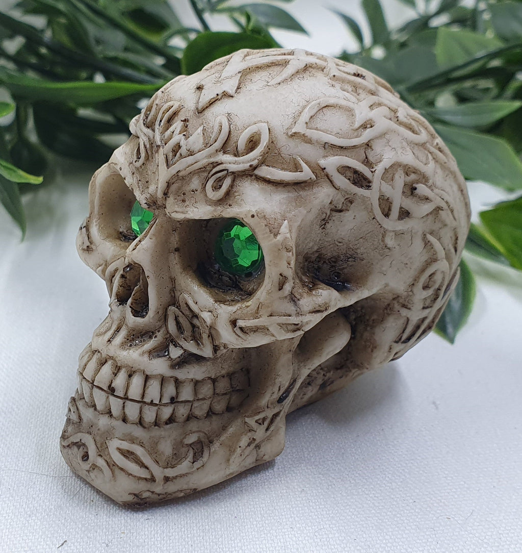 Skulls with Green Eyes