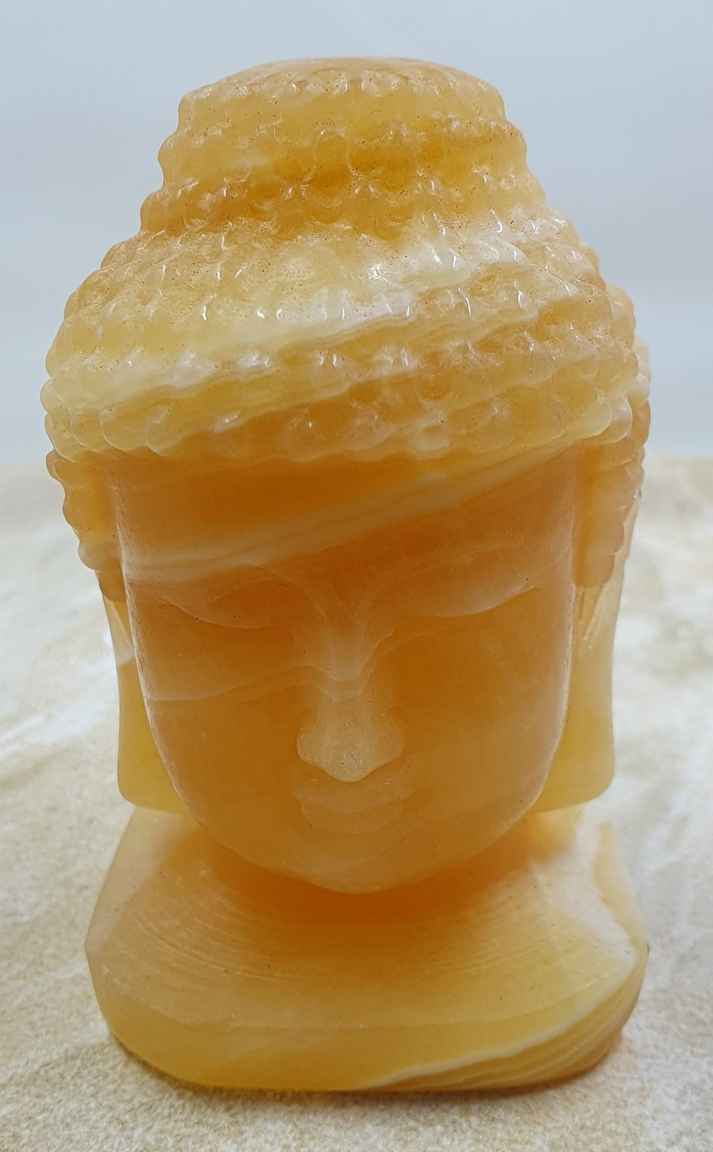 Orange Calcite Buddha Head